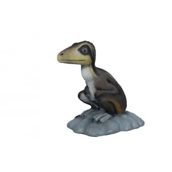 Siedzący nieletni Teropod